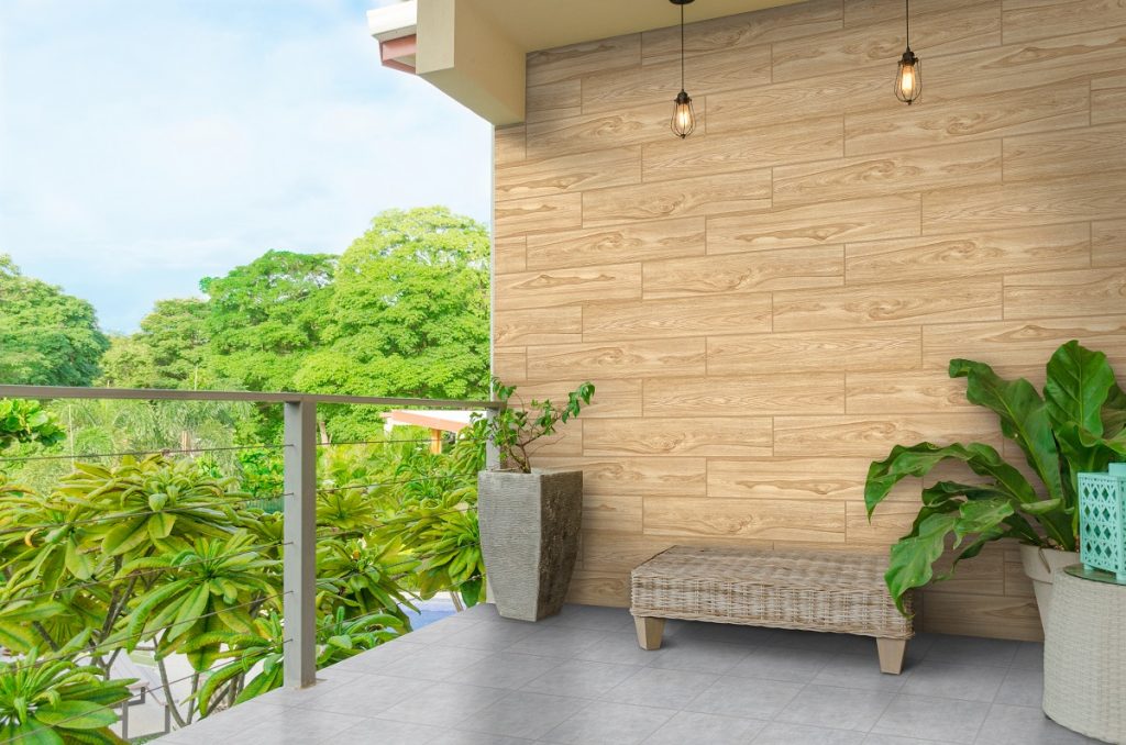 Balcony with green view and light blue sky,, lamps, plants and b